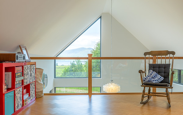 views across Loch Linnhe from gallery of architect designed mezzanine in extension