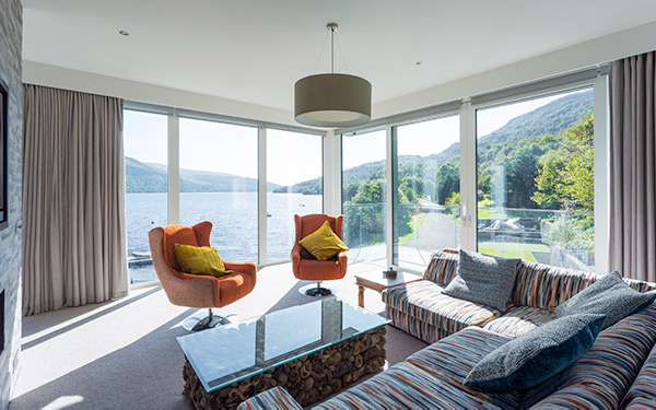 living room with terrace views over Loch Lomond