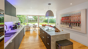 Open plan kitchen dining in glazed extension in Bearsden
