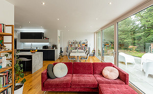Living dining area in extension with sliding glass doors in Bearsden