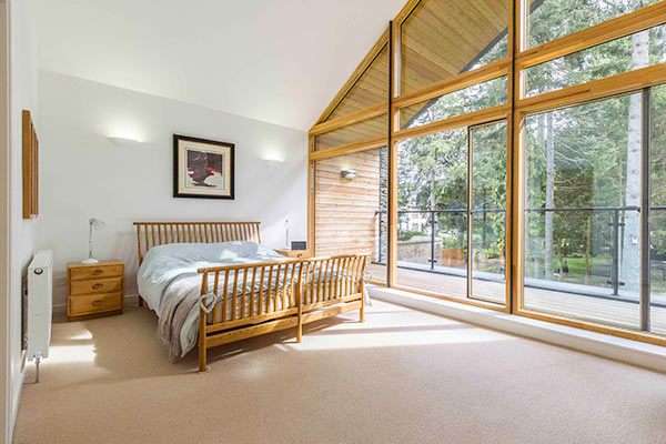 master bedroom in architect designed Perthshire house